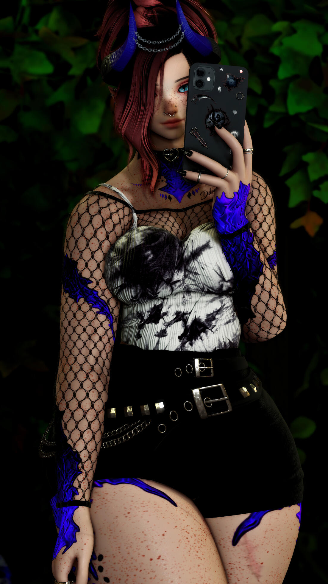 Sylvia takes a selfie with her tomestone while she is sitting on the ground in front of a mirror.